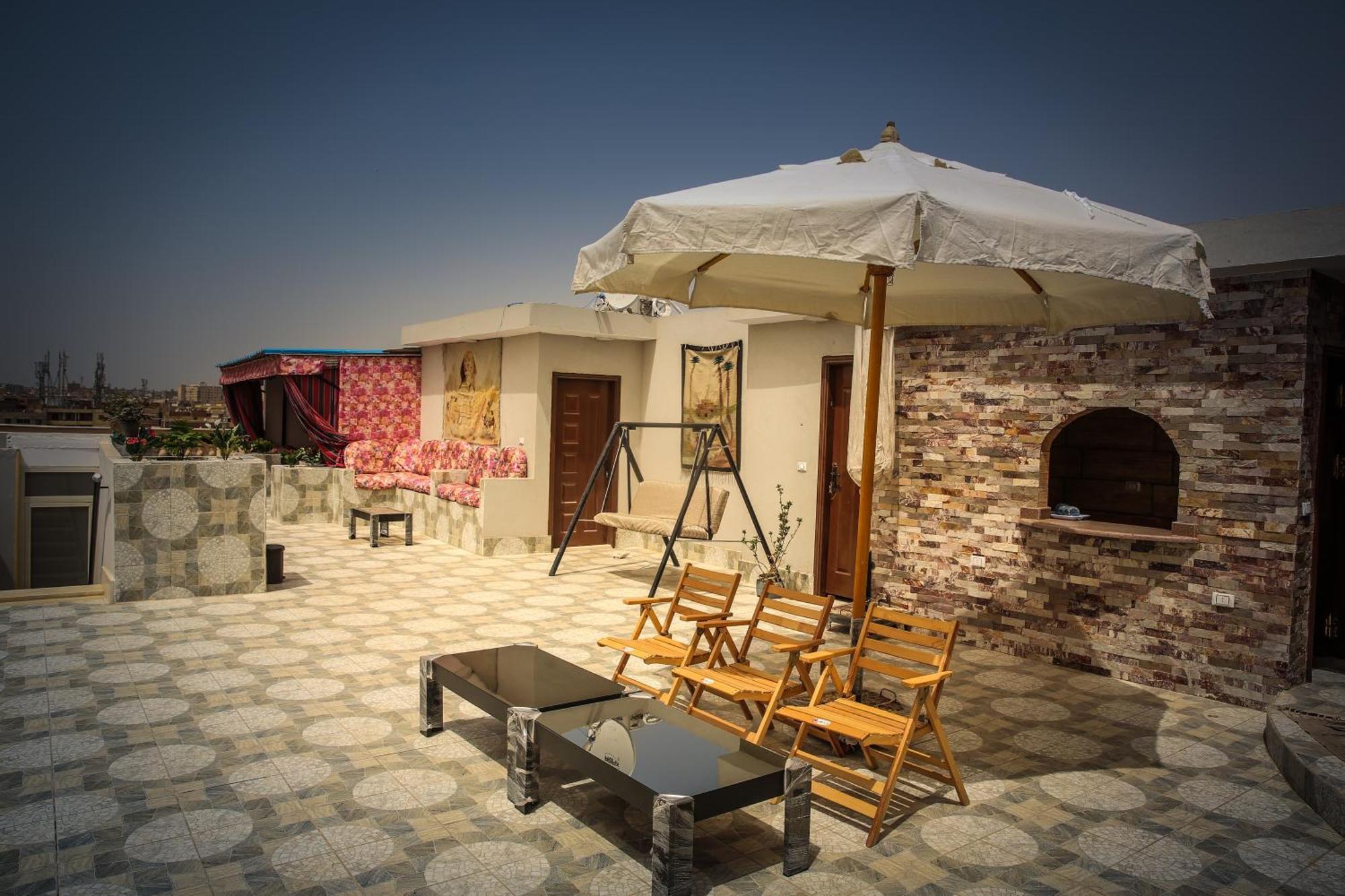 Queen Pyramids View Inn Kafret el-Gabal Exterior foto